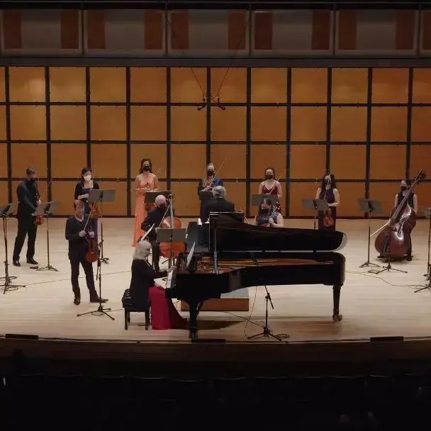 Sinfonia Toronto performance, Nurhan Arman, conductor, performing duo concertos by Larysa Kuzmenko, Alice Ping Ho, and Christos Hatzis, with violinist, Marc Djokic.